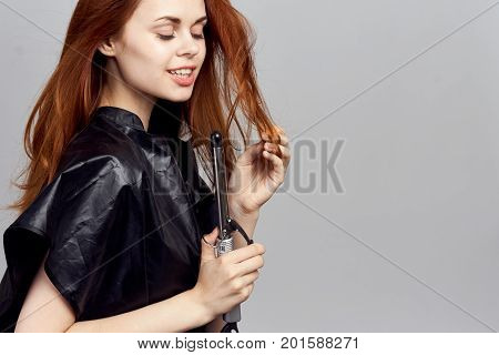 Beautiful woman holding a ployka, empty space for copy.