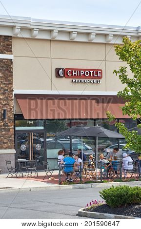 PLATTSBURGH USA - AUGUST 23 2017 : Chipotle restaurant and logo. Chipotle Mexican Grill Inc is an American chain of fast casual restaurants in the United States