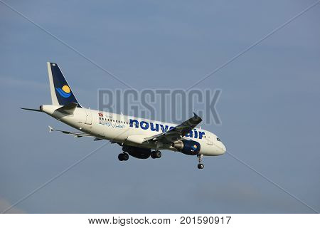 Amsterdam the Netherlands - July 7th 2017: TS-INQ Nouvelair Tunisie Airbus A320 approaching Schiphol Amsterdam Airport Polderbaan runway