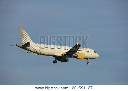 Amsterdam the Netherlands - July 7th 2017:EC-JZI Vueling Airbus A320 approaching Schiphol Amsterdam Airport Polderbaan runway