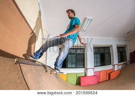 Skateboarder Performing A Trick