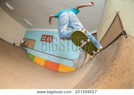 Skateboarder Performing A Trick