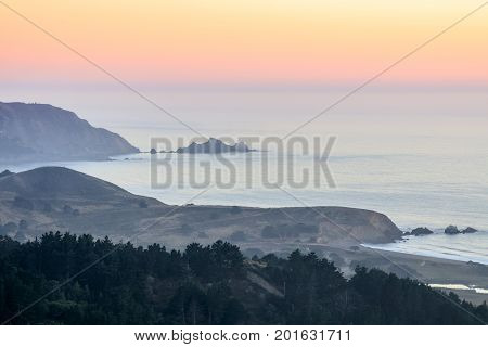 Summer Haze Sunset over San Mateo Coast. Milagra Ridge, Pacifica, San Mateo County, California, USA.
