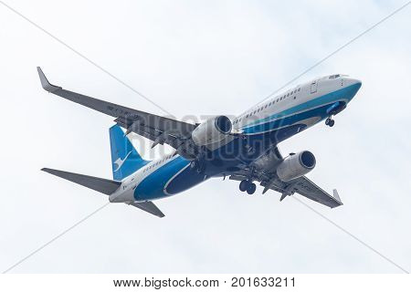 Bangkok, Thailand. - April 22, 2017 : Aircraft or Plane of Xiamen Airlines or Airways on the sky landing to Suvanabhumi airport.