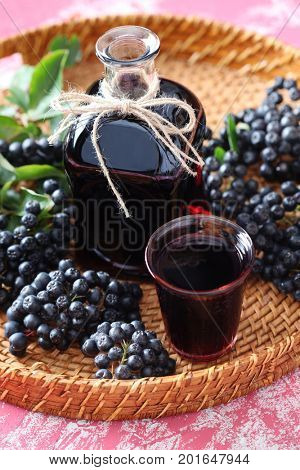 homemade chokeberry juice or liqueur - food and drink