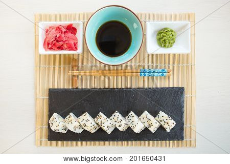 Fresh Homemade Sushi Roll. Fried Sushi On Black Slate Surface. Japanese Food