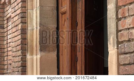 An Old Wood Doorway And Brickface Wall
