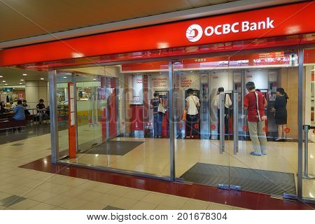 SINGAPORE - AUGUST 20 2017: Customers waiting to be served in OCBC Bank in Singapore. OCBC oversea Chinese Banking Corporation is a financial services organization based in Singapore.