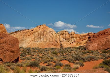 Landscape into Valley of fire in Nevada with mountains in background