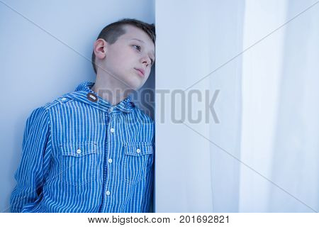 Worried Boy Spends Afternoon Alone