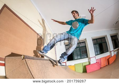 Skateboarder Performing A Trick