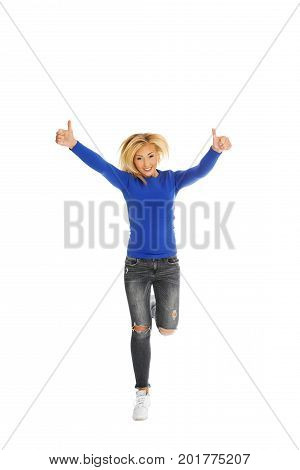 Young happy woman is jumping. Freedom and joyful.