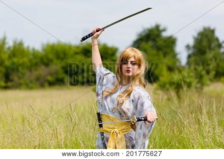 Portrait Of Samurai Girl With A Sword