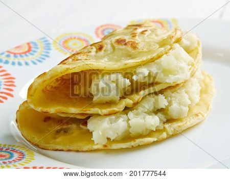 Qistibi. Roasted Flatbreads With Potatoes