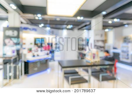 Abstrast Blurred background : Retail shop in shopping mall for consumerism background