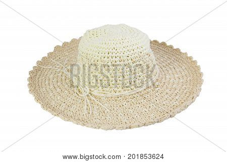Woven beige hat decorated with rope, isolated on a white background.