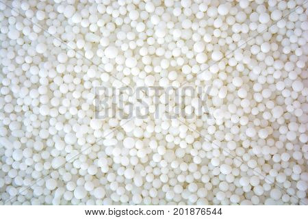 Photo of white saltpeter texture consist of many little balls