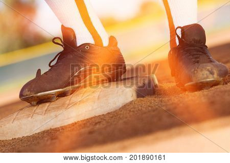 Baseball Player Standing on Base