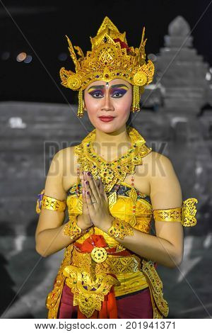 Uluwatu, Indonesia - August 29, 2017: A Balinese dancer and actor perform in the Kecak ceremony.
