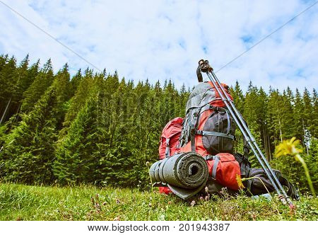 Backpacks in the mountains with views of the mountains.