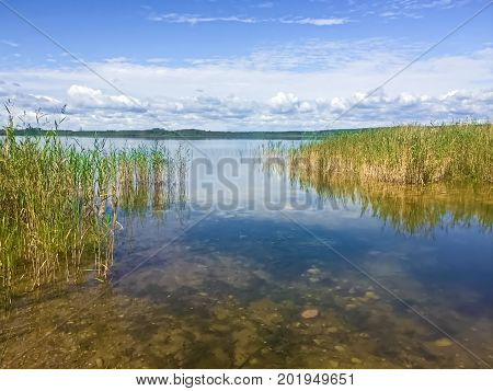 A river flowing into First Mustus Lake in Saskatchewan.