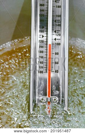 View Of A Thermometer As It Reaches Boiling Point