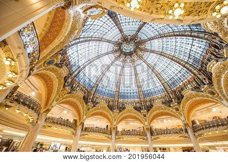 PARIS, FRANCE - August 02, 2017: Interior view of the Lafayette commercial centre on Haussmann boulevard in Paris. This gallery is a part of the company Groupe Galeries Lafayette
