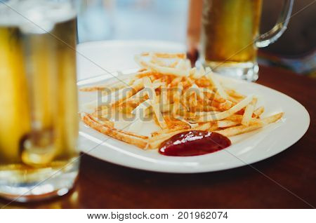 Golden French Fries Potatoes Ready To Be Eaten