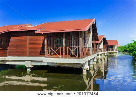 Cayo Coco island, Cuba, Iberostar Mojito resort, July 17, 2017, gorgeous, amazing inviting view of hotel grounds with villa houses standing in natural sea water in tropical garden on sunny great day
