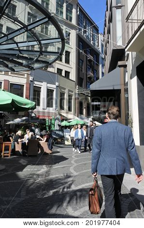 Businessman Walks In Chancery Square Auckland New Zealand