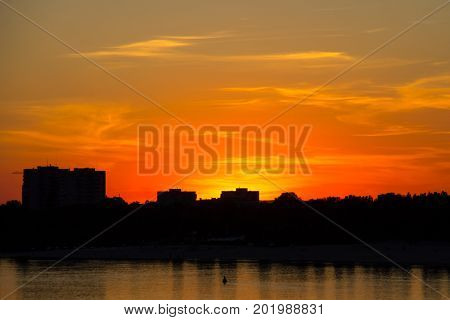 Orange Sunset Over A River Dnieper In Kremenchug City, Ukraine