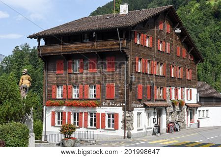 The Typical Chalet At Burglen On The Swiss Alps