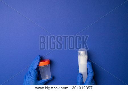 Concept Of Bank Sperm. Infertility. Test Tube With The Analysis Of Sperm Leaves
