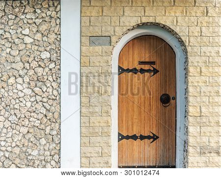 Stock Photo Minimalist Clean Brick Home Exterior With Wooden Front Door And With Lock