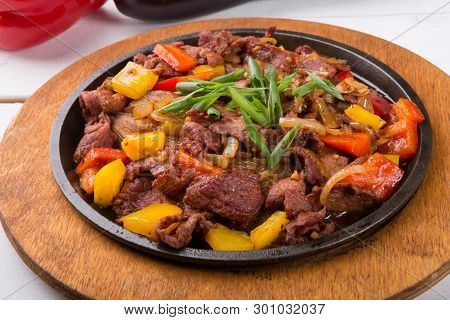 Meat Mix Sizzler Prepared And Served For Lunch