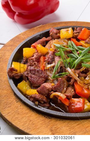 Meat Mix Sizzler Prepared And Served For Lunch
