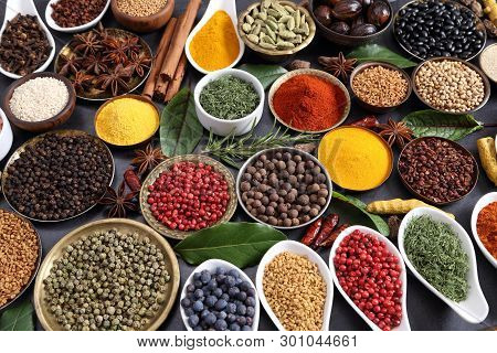 Aromatic Spices And Herbs In Metal And Ceramic Bowls. Top View.