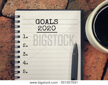 New Year Goal Concept - Goals 2020 Written On A Notebook.