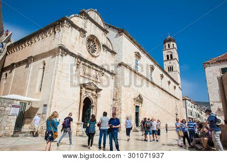 Dubrovnik, Croatia - April, 2018: Tourists At The Church Of St. Spasa Located At Stradun Street In T