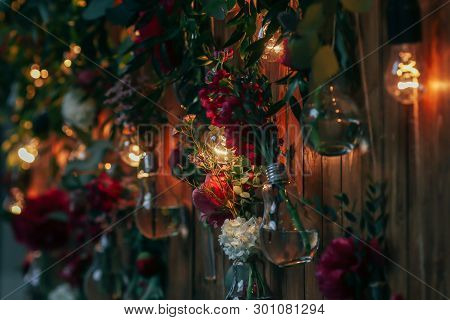 Rustic Wedding Photo Zone. Hand Made Wedding Decorations Includes Photo Booth  Red Flowers. Garlands