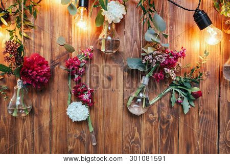 Rustic Wedding Photo Zone. Hand Made Wedding Decorations Includes Photo Booth  Red Flowers. Garlands