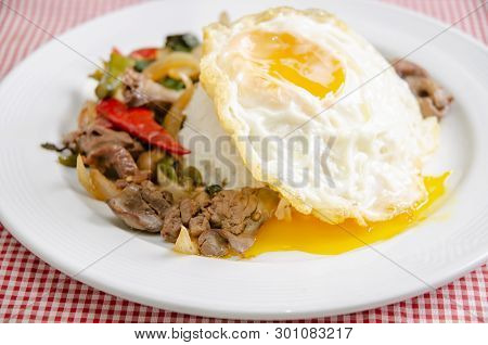 Fried Rice With Basil Leaves And Red Cloth On The Table.ngredients Of Basil Fried Chicken And Fried 