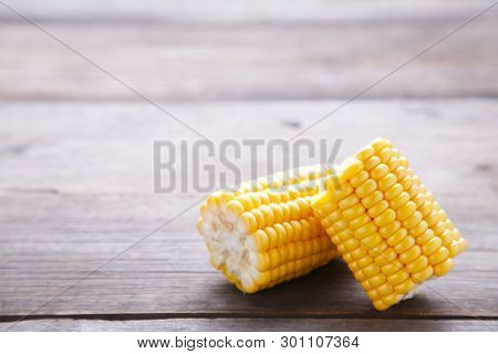 A Fresh Corn On A Grey Wooden Background. Corn On A Rustic Table