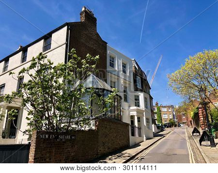 HAMPSTEAD, LONDON - MAY 14, 2019: Large houses with lots of historic character on New End Square in Hampstead, North London, UK.