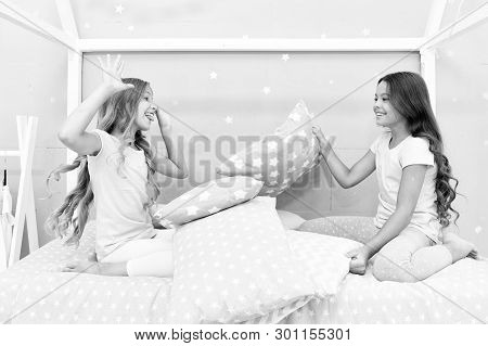 Soulmates Girls Having Fun Sleepover Party. Girls Happy Friends With Cute Pillows. Pillow Fight Paja