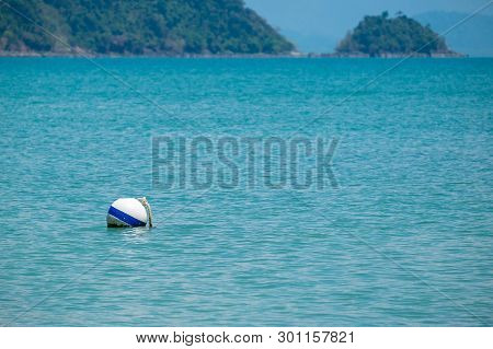 White Buoyancy Ball Floating In The Sea.