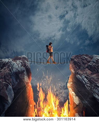 Surreal Challenge Overcome . Woman Conquering Obstacle Balancing On Slackline Rope Above A Gap With 