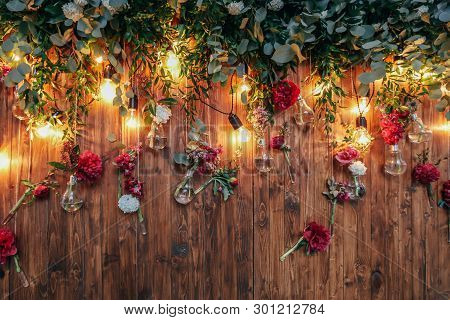 Rustic Wedding Photo Zone. Hand Made Wedding Decorations Includes Photo Booth  Red Flowers. Garlands