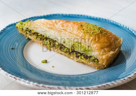 Turkish Baklava With Pistachio Served With Plate / Havuc Dilimi.