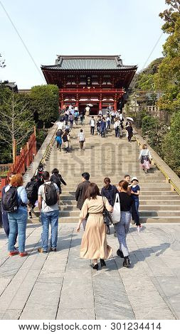 Kamakura, Japan - 19 April, 2019: People Walking In The Tsurugaoka Hachimangu. The Temple Is The Mos